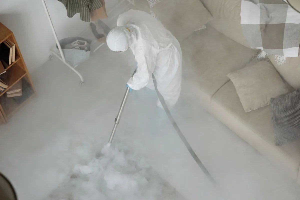 Biohazard cleanup technician in protective equipment, Barnegat, NJ